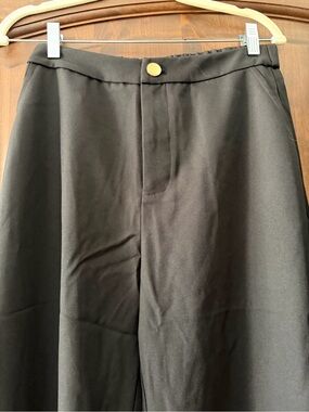 NWOT. Size M. Never worn. Jacket & slacks Black. So comfy. Very nice looking set